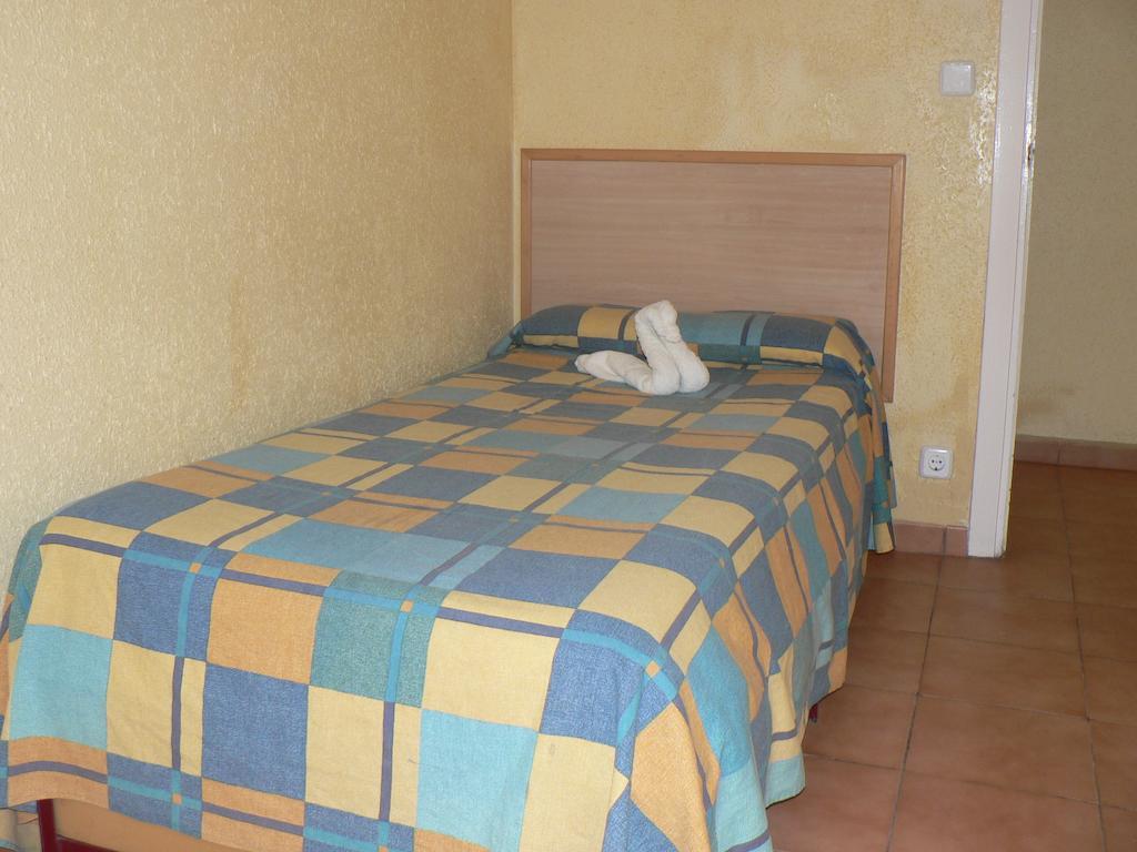 Habitación Individual Económica con baño compartido